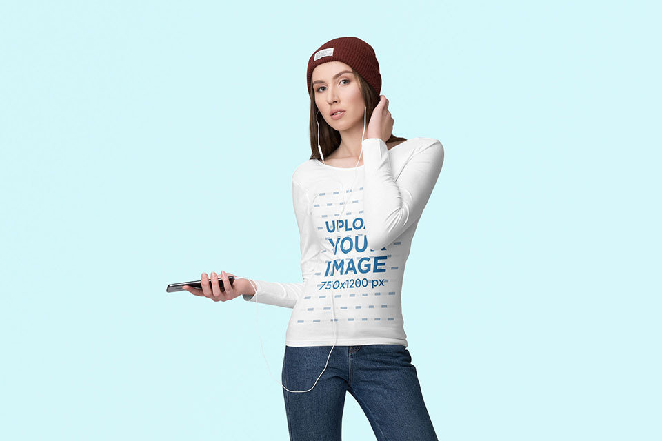 Long Sleeve Tee Mockup of a Woman Listening to Music From Her Phone