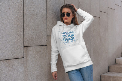Mockup of a Serious Woman With Sunglasses Wearing a Customizable Hoodie 