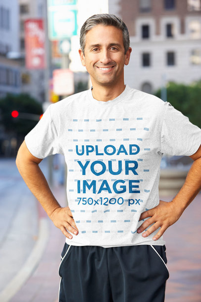 Mockup of a Middle-Aged Man with a Heathered T-Shirt Standing on the Street