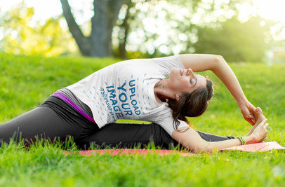 T-Shirt Mockup of a Woman Doing Yoga in Nature
