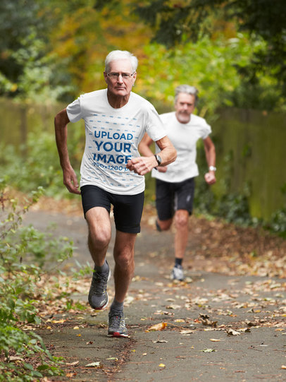 T-Shirt Mockup of a Senior Man Running in Nature