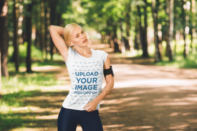 T-Shirt Mockup of a Woman Working Out in Nature