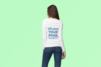 Back View Mockup of a Long-Haired Woman Wearing a Long Sleeve Tee at a Studio 