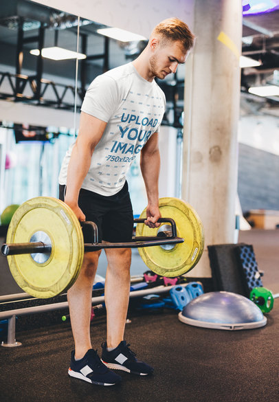 T-Shirt Mockup of a Man Doing Hex Bar Deadlifts
