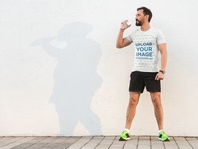 Heather T-Shirt Mockup of a Sporty Man Drinking Water 