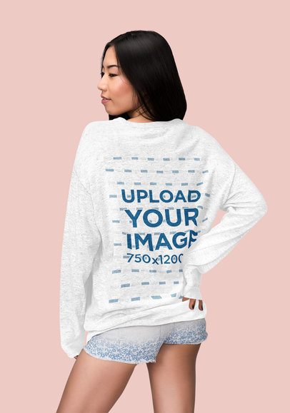 Back-View Mockup of a Woman Wearing a Customizable Heather Sweatshirt at a Studio 