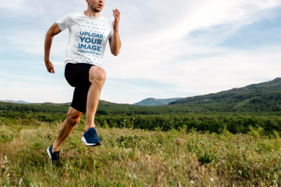 T-Shirt Mockup of a Man Running Outdoors