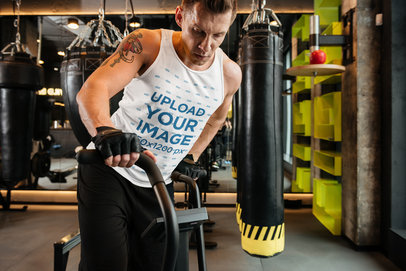 Tank Top Mockup of a Man Doing Cardio at the Gym