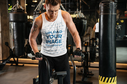 Mockup of a Man Wearing a Tank Top at the Gym