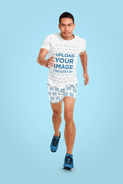 Mockup of an Athlete Wearing a T-Shirt and Sublimated Shorts in a Studio 37869-r-el2