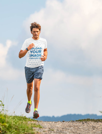 T-Shirt Mockup of a Male Runner Training Outdoors