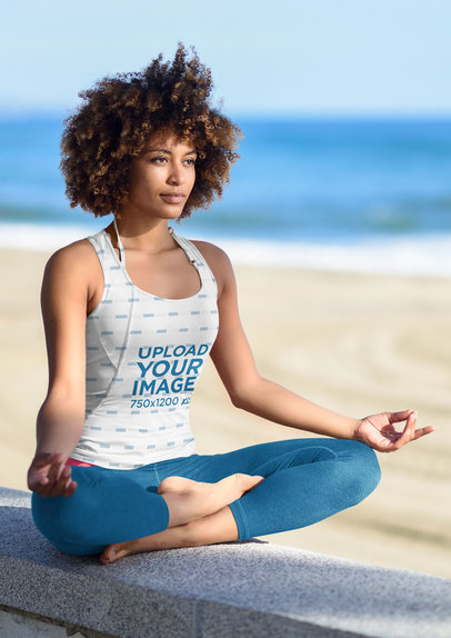 Tank Top Mockup of a Woman Meditating at the Beach