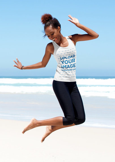 Tank Top Mockup of a Woman Jumping at the Beach