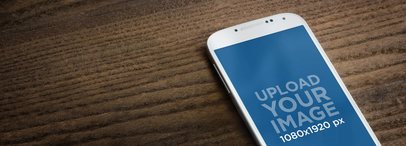 Samsung Galaxy Mockup Featuring a Wooden Surface 