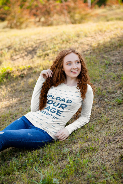 Heather Long Sleeve Tee Mockup of a Woman Lying on the Grass 