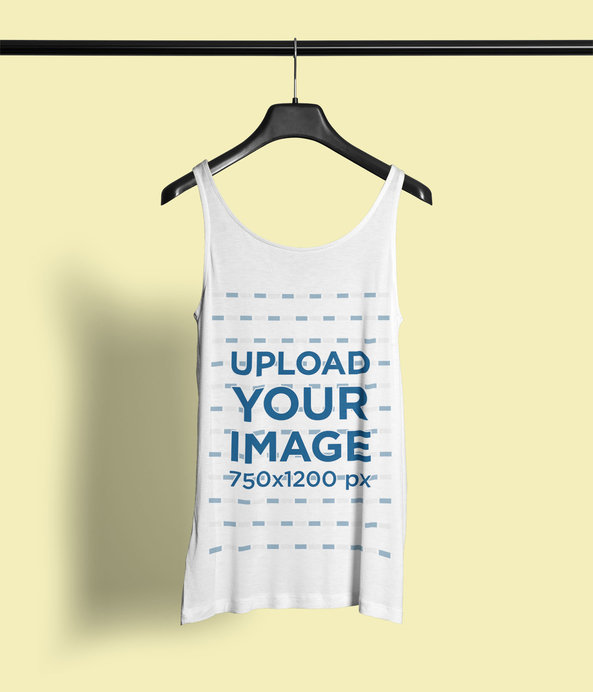 Placeit - Mockup Featuring a Customizable Tank Top Hanging Against a ...