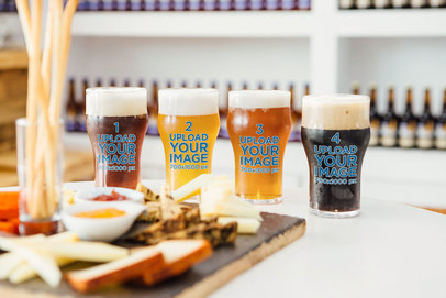 Mockup Featuring Four Beer Glasses Placed by a Cheeseboard 35484-r-el2