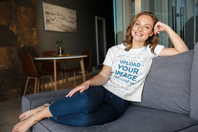 Mockup of a Woman in a Heather Tee Relaxing at Home 