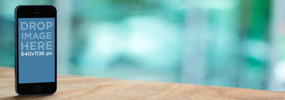 iPhone Grey 5S Mockup on a Wooden Table