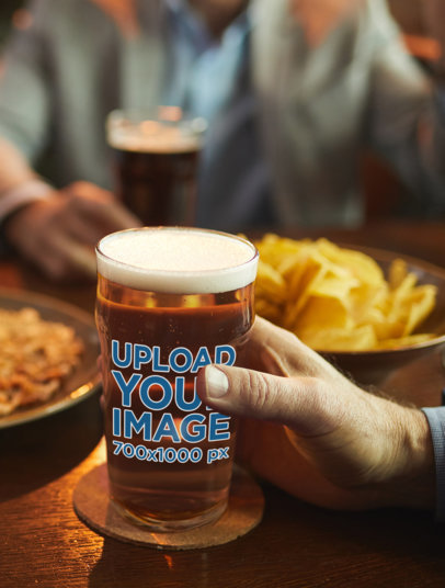 Beer Glass Mockup Featuring Some Friends at a Bar