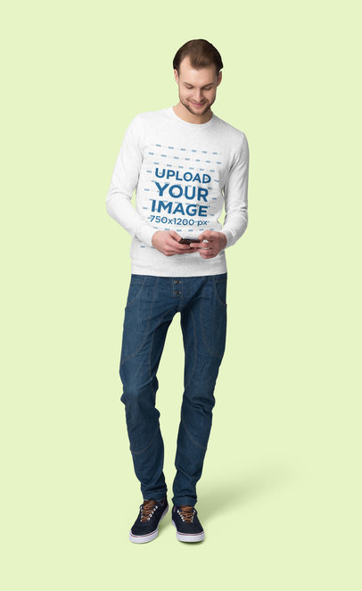 Sweatshirt Mockup Featuring a Man Looking at His Phone 
