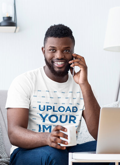 T-Shirt Mockup of a Man Working from Home