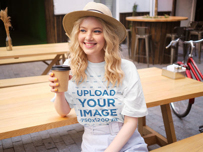 Mockup of a Cheerful Young Woman Wearing a T-Shirt 
