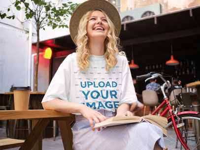 T-Shirt Mockup of a Young Woman Laughing