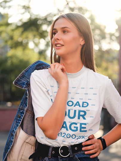 T-Shirt Mockup of a Stylish Woman Posing on the Street