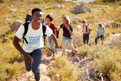 T-Shirt Mockup Featuring a Smiling Man Doing Group Hiking