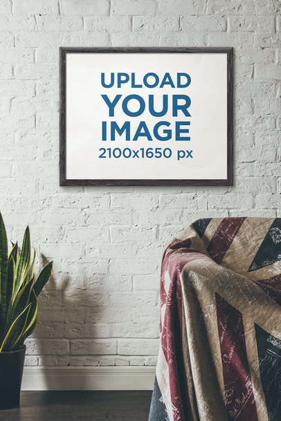 Art Print Mockup Featuring a Painted Brick Wall and an Indoor Plant