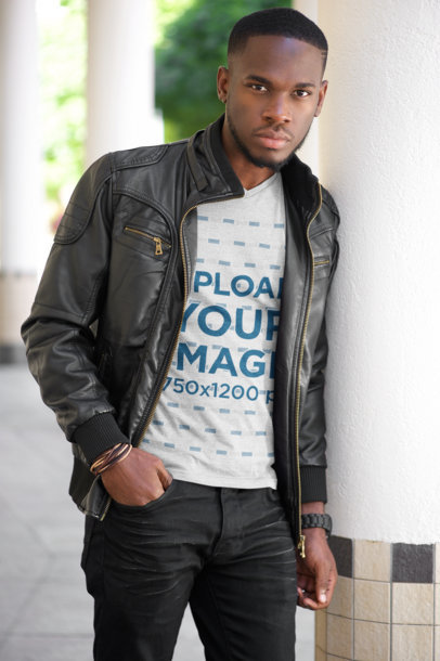 Mockup of a Man with a Heathered V-Neck T-Shirt Leaning Against a White Pillar 35311-r-el2