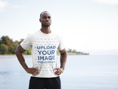 Activewear T-Shirt Mockup of a Fit Man Standing by a Lake 38678-r-el2