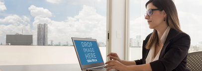 Product Mockup Featuring a Woman Using a Laptop