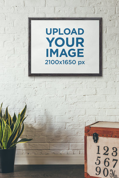 Art Print Mockup Featuring a Leather Trunk and an Indoor Plant 