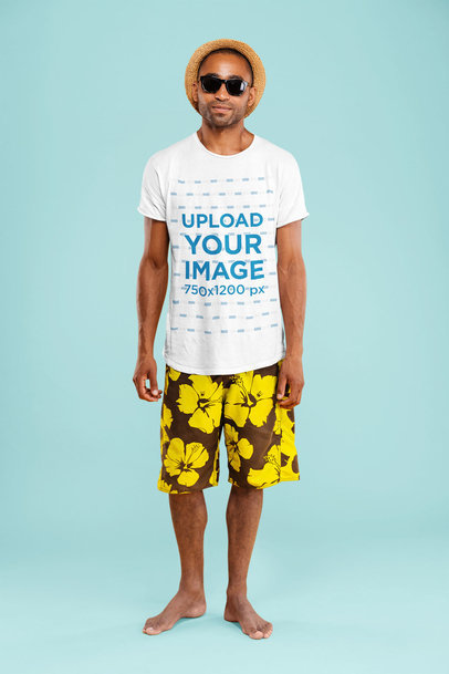 T-Shirt Mockup of a Man with a Beach Style Posing at a Studio 