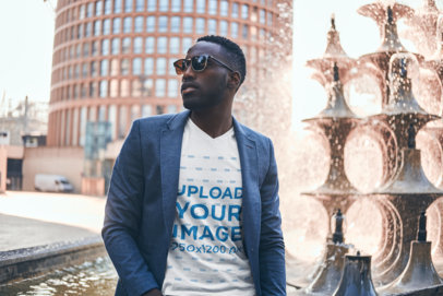 T-Shirt Mockup of a Fashionable Man Posing