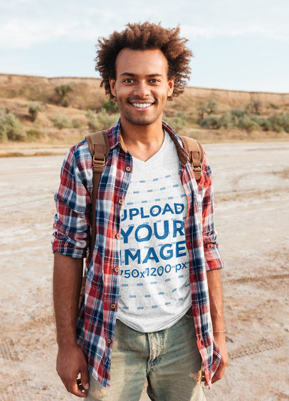 Heathered V-Neck Tee Mockup of a Bearded Man Traveling 