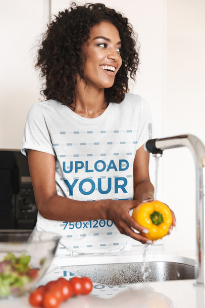 T-Shirt Mockup of a Woman Washing Vegetables