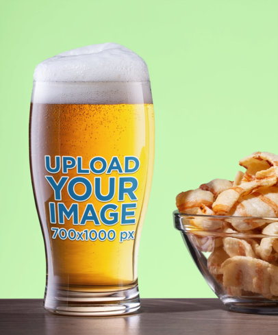 Mockup of a Beer Glass Next to a Bowl of Snacks