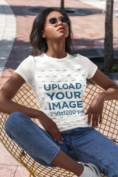 T-Shirt Mockup of a Woman Enjoying the Sun 