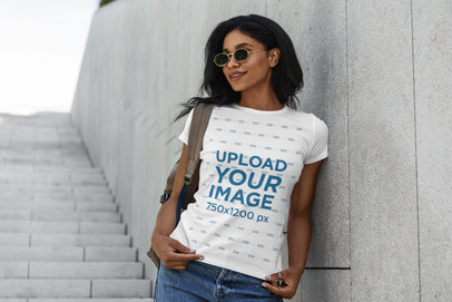 T-Shirt Mockup of a Woman Posing by a Stairway