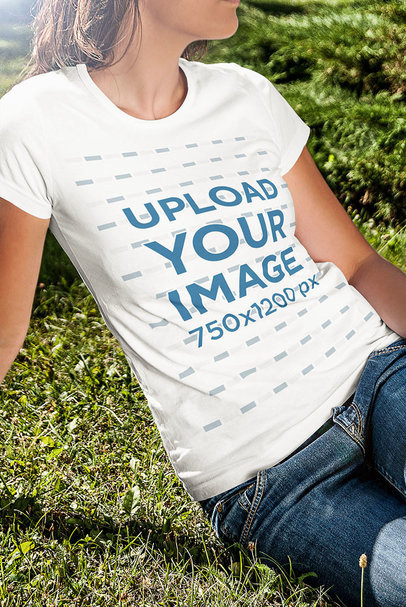 Crew Neck T-Shirt Mockup of a Woman Sitting on the Grass