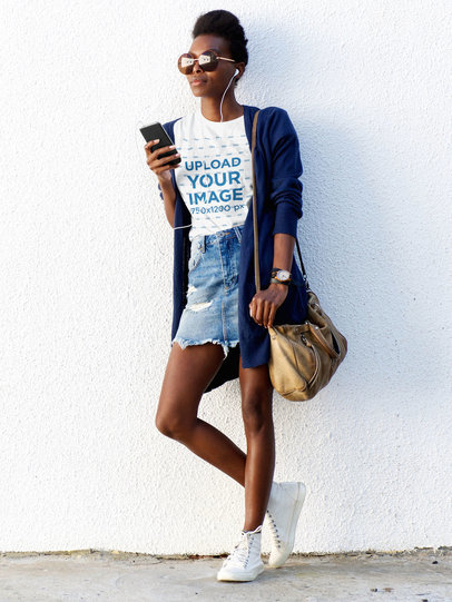 T-Shirt Mockup of a Stylish Woman Leaning by a Wall While Texting 38794-r-el2