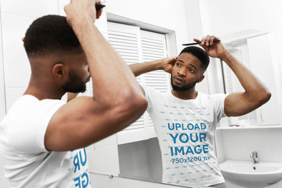 T-Shirt Mockup of a Man Combing His Hair 