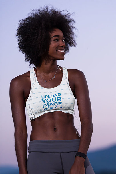 Mockup of a Woman Wearing a Sports Bra and a Big Smile