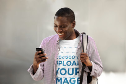T-Shirt Mockup of a Young Man on His Way to Class