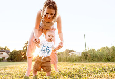 Onesie Mockup Featuring a Baby Taking His First Steps with His Mom 36003-r-el2