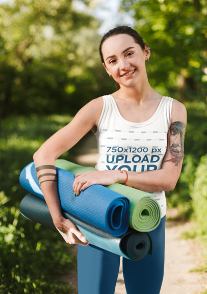 Tank Top Mockup of a Woman with Tattoos Getting Ready to Practice Yoga