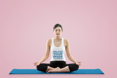 Tank Top Mockup of a Young Woman Doing Yoga Meditation